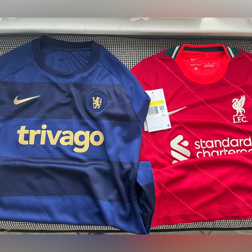 COPY - 2 men’s small original Chelsea and Liverpool jerseys.